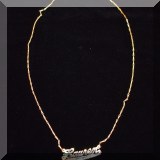 J02. Gold “Lauren” necklace. 